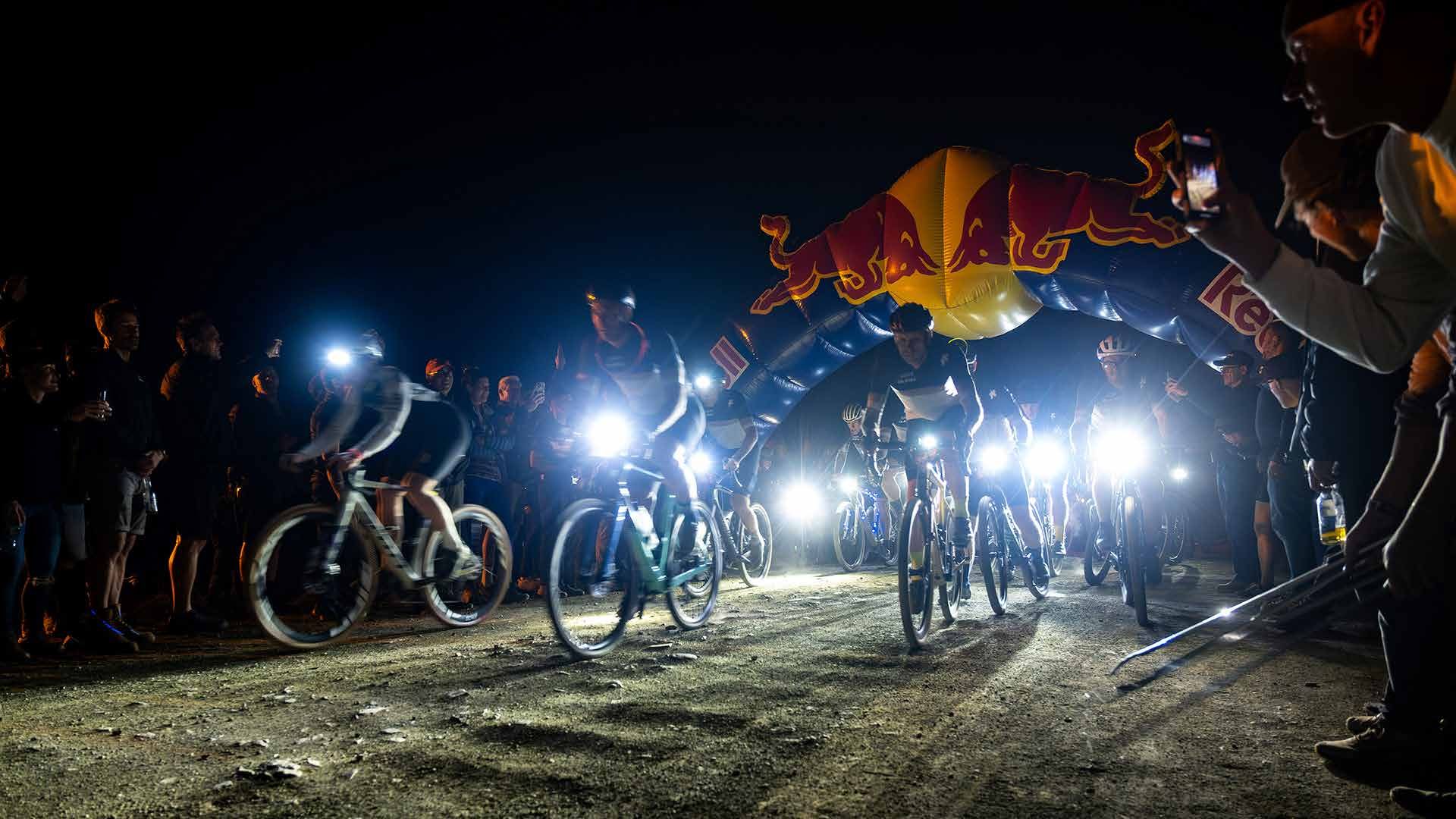 Riders with lights at the start of the Night Burn